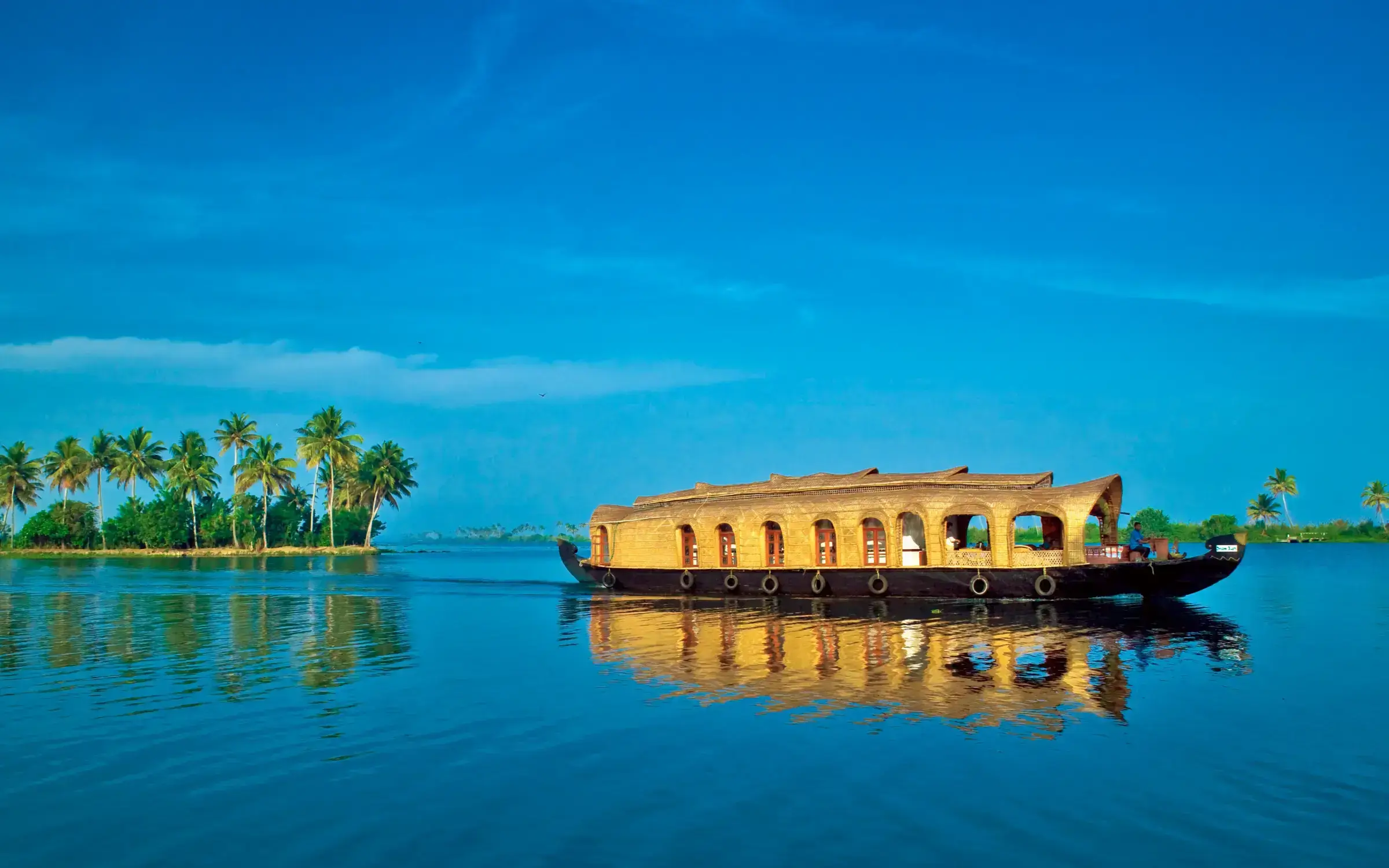 Houseboat cruising through Alleppey backwaters